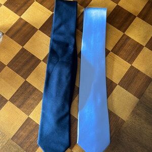 Men’s neck ties. Light blue and black.  Sold together.